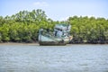 Krabi, Thailand, March 7, 2016: Old abandoned ship aground.