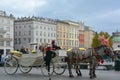 The most romantic way to tour Krakow is by the horse-drawn carriages t