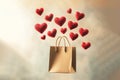 kraft bag with falling down or flying red hearts Royalty Free Stock Photo