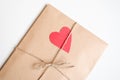 Kraft envelope with red heart