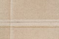 Kraft paper, cardboard with strip close-up. Surface texture of paper