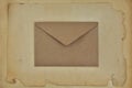 Kraft paper envelope on vintage paper with space for text. Royalty Free Stock Photo