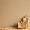 Kraft paper shopping bags on wooden table Royalty Free Stock Photo