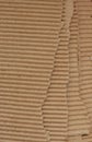 Kraft paper texture striped pattern for wrapping. texture background. Ripped piece of Cardboard torn edges Royalty Free Stock Photo