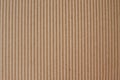 Kraft paper texture striped pattern for wrapping. texture background. Ripped piece of cardboard isolated on white background. Royalty Free Stock Photo