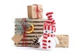 Kraft stylish Christmas gift boxes with a Christmas ball isolated on a white