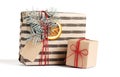 Kraft stylish christmas gift boxes isolated on white Royalty Free Stock Photo