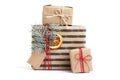Kraft stylish christmas gift boxes isolated on white Royalty Free Stock Photo