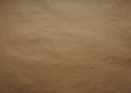 Kraft wrapping paper. Sheet. Brown color The texture. Top view, close-up