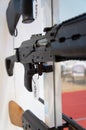 Military, police, automatic rifle in selective focus on display. Chamber and trigger