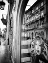 Krakow, architecture, reflections in shop windows. Artistic look in black and white.