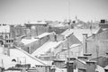 Krakow in Christmas time, aerial view on snowy roofs in central part of city. BW photo. Poland. Europe