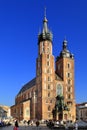 Krakow, Lesser Poland / Poland - 2017/03/28: Cracow Old Town, St. Mary cathedral and medieval tenements by Main Market Square