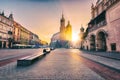 Krakow old town, Market square with St. Mary`s church at sunrise, historical center cityscape, Poland, Europe Royalty Free Stock Photo