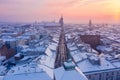 Krakow Old Town in winter. Snow on roofs at Old Town in winter Krakow Poland at sunset. Main tourist walking street, historical ma Royalty Free Stock Photo