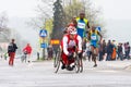 KRAKOW, POLAND - APRIL 28 : Cracovia Marathon.Handicapped man marathon runners in a wheelchair on the city streets