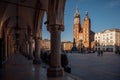 Krakow, Poland - 28 April 2021. St Mary`s Basilica Mariacki Church in the Old town.  The main Market Square at sunset Royalty Free Stock Photo