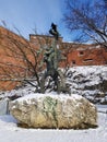 KRAKOW, POLAND, 2021 - Artistic sculpture of the legendary Wawel Dragon breathing fire at the foot of Wawel Castle.