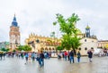 KRAKOW, POLAND, AUGUST 11, 2016: Panorama of the rynek glowny main square with the church of Saint Adalbert, town hall Royalty Free Stock Photo