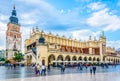 KRAKOW, POLAND, AUGUST 11, 2016: Panorama of the rynek glowny main square with the town hall and sukiennice marketplace Royalty Free Stock Photo