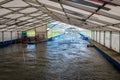 Krakow, Poland - August 27th, 2022: Beginnig of the whitewater canoening track in Krakow. Big tent where canoeist are preparing Royalty Free Stock Photo