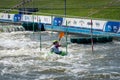 Krakow, Poland - August 27th, 2022: Canoeist struggling with the power of rushing current in whitewater canoening track in Krakow Royalty Free Stock Photo