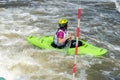 Krakow, Poland - August 27th, 2022: Canoeist struggling with the power of rushing current in whitewater canoening track in Krakow Royalty Free Stock Photo