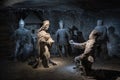 Wieliczka Salt Mine underground scene with statues carved by miners out of the rock salt, Krakow, Poland, tourist landmark