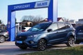 Krakow, Poland 03.15.2020: Blue Ford Kuga in the Parking lot of the Commission car center among other cars . Sale of Commission u