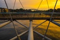 Krakow, Poland - Cracow Old Town, evening view of the modernistic pedestrian bridge Kladka Ojca Bernatka over Vistula river Royalty Free Stock Photo