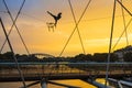 Krakow, Poland - Cracow Old Town, evening view of the modernistic pedestrian bridge Kladka Ojca Bernatka over Vistula river Royalty Free Stock Photo