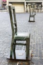 KRAKOW,POLAND - DECEMBER 17, 2015: Chairs monument at the cobbled square