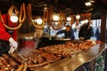 KRAKOW, POLAND - DECEMBER 05, 2019: A stand with cold cuts and meat dishes at the Christmas market