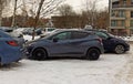 Krakow, Poland: Uber taxi waiting for passenger during winter around snow. Europe Royalty Free Stock Photo