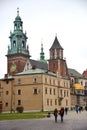 Krakow, Poland, December 23, 2018: Wawel Cathedral - Silver Bell Tower with coned roof Sigismund Chapel with small golden dome