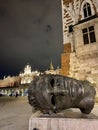 Krakow, Poland. Eros Bendato Sculpture, large head sculpture.