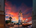 Krakow, Poland. Famous Landmark On Old Town Square In Summer Evening. Old Town Hall Tower In Night Lighting. UNESCO Royalty Free Stock Photo