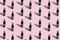 Krakow, Poland - February 29, 2020: glass Pepsi bottles on a light pink background. Retro design. Pattern with sunlight effect