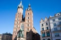 Old city center view with Adam Mickiewicz monument and St. Mary`s Basilica in Krakow Royalty Free Stock Photo