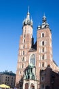 Old city center view with Adam Mickiewicz monument and St. Mary`s Basilica in Krakow Royalty Free Stock Photo