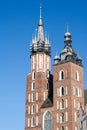 Old city center view with Adam Mickiewicz monument and St. Mary`s Basilica in Krakow Royalty Free Stock Photo