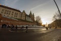 Krakow, Poland - February 22, 2021: Road to the main entrance to royal Wawel castle and people walking toward entering the castle
