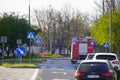 Krakow, Poland 22.04.2020: a Fire truck with flashing lights goes to help people on city streets, put out a fire or Royalty Free Stock Photo