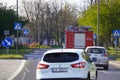 Krakow, Poland 22.04.2020: a Fire truck with flashing lights goes to help people on city streets, put out a fire or Royalty Free Stock Photo