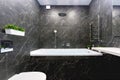 home interior. Modern bathroom in black and white colors with marble finishing Royalty Free Stock Photo