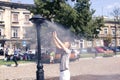 Krakow, Poland, July 28, 2018, A young man stands under a stree