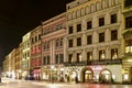 KRAKOW, POLAND - MARCH 19, 2016: City center by night: ancient temements. Grodzka Street Royalty Free Stock Photo