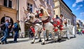 KRAKOW, POLAND - 10 of May, 2019: Horse carriage on the street of the old town in Krakow, Poland. Two horses in beautiful old-