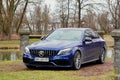Krakow, Poland 19.02.2020: New luxury sport car Mercedes-benz C-class C63 AMG W205 blue color, parking in city park