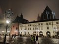 Krakow, Poland - November 08, 2019: Wide angle view of the little market square, Maly Rynek, in old town of Cracow and long